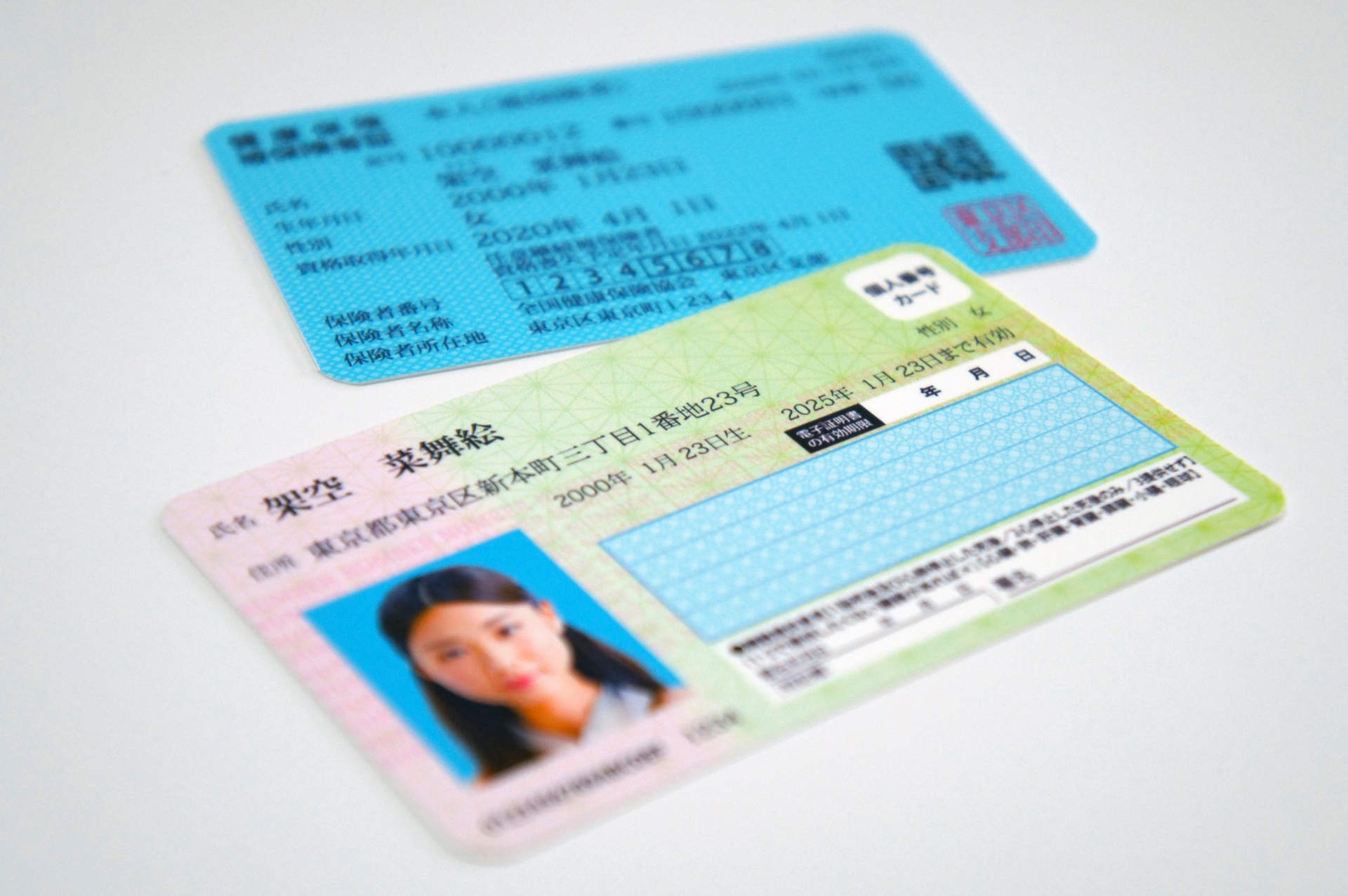 A hospital staff member who checks health insurance cards at an outpatient waiting area.